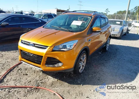 2016 Ford Escape Titanium z USA, uszkodzony, nr VIN 1FMCU9J93GUA18235